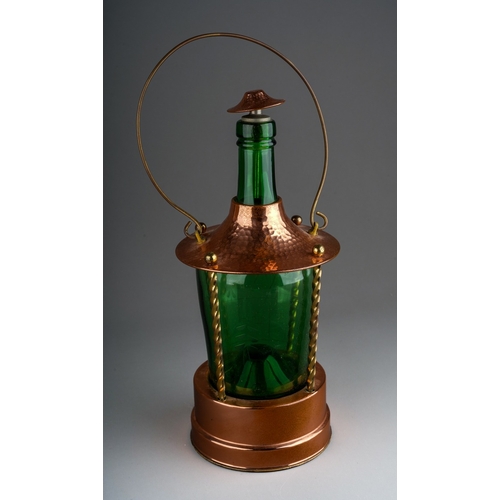 435 - Musical decanter in form of a lantern,  hand plenished copper body with green etched glass bottle to... 