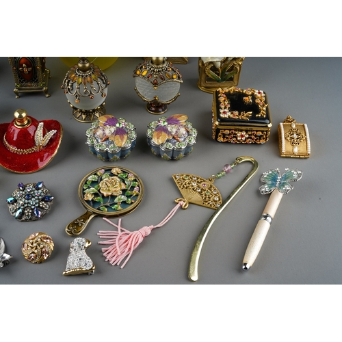 437 - A collection of  enameled filigree glass scent bottles, ornaments and enameled trinket pots. 
To inc... 