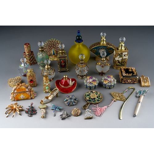 437 - A collection of  enameled filigree glass scent bottles, ornaments and enameled trinket pots. 
To inc... 