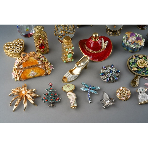 437 - A collection of  enameled filigree glass scent bottles, ornaments and enameled trinket pots. 
To inc... 