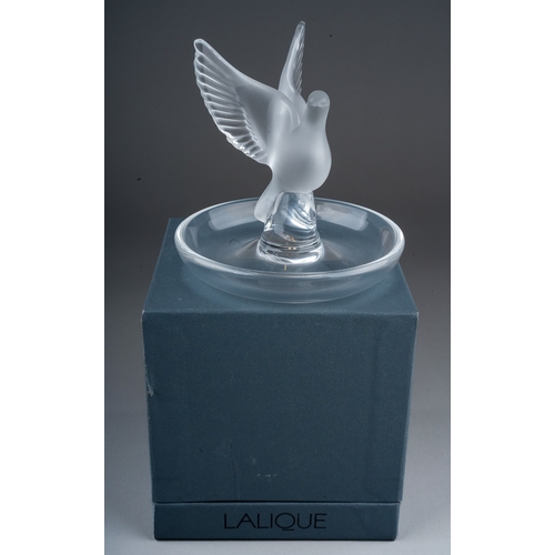 438 - Boxed Lalique pin dish with a central dove , signed to base