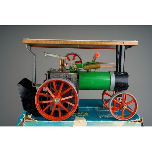 453 - A boxed Mamod T.E.1a Steam Tractor, with reverse control lever, instructions and other bagged access... 