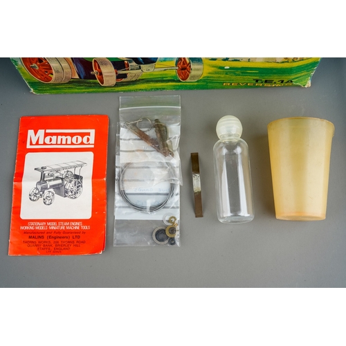 453 - A boxed Mamod T.E.1a Steam Tractor, with reverse control lever, instructions and other bagged access... 