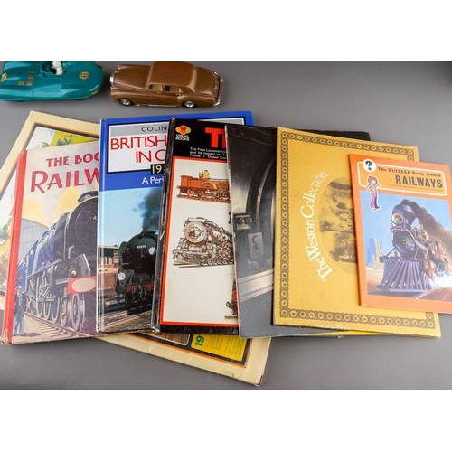 459 - A collection of boxed and loose toy cars, etc and railway related books, postcards, etc, including a... 