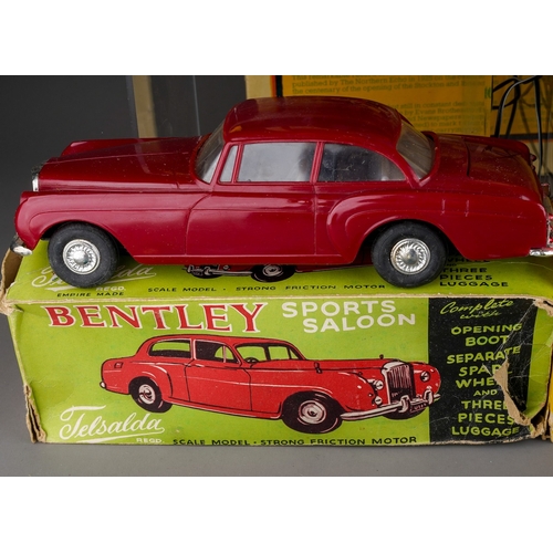 459 - A collection of boxed and loose toy cars, etc and railway related books, postcards, etc, including a... 