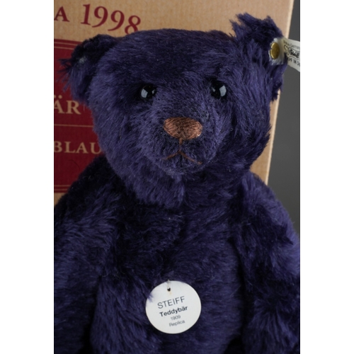 463 - A Steiff Replica 1909 Teddy Bear, dark blue growler, button and white label to ear, limited edition ... 