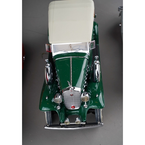 470 - Three Danbury Mint 1:24 scale die-cast model cars to include: 1934 Packard V-12 Lebaron Speedster; 1... 