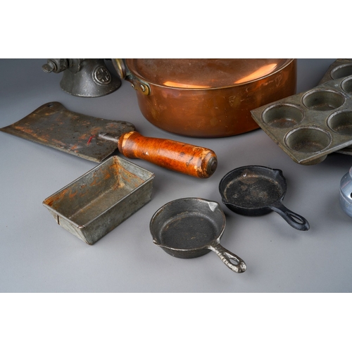 482 - Assorted vintage cooking utensils including mincer, fairy cake tins, copper pan and cover, cookery p... 