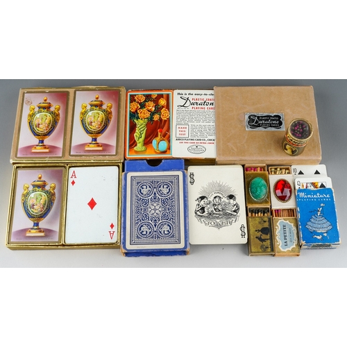 484 - A selection of vintage playing cards (sets unchecked) including Congress Canasta, Duratone plastic c... 