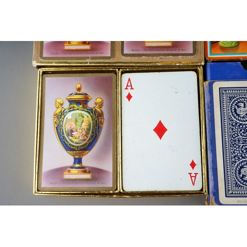 484 - A selection of vintage playing cards (sets unchecked) including Congress Canasta, Duratone plastic c... 