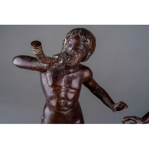 496 - A pair of early 20th Century bronze figures of Classical figures playing pipes (Pan) on raised integ... 