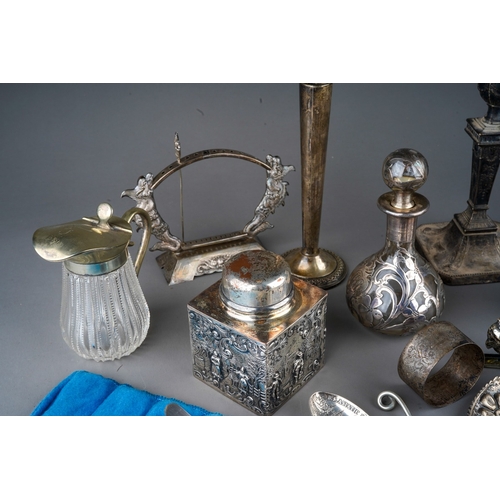 498 - An Edwardian silver Neo-Classical candlestick, hallmarked London, 1902, filled and tarnished togethe... 