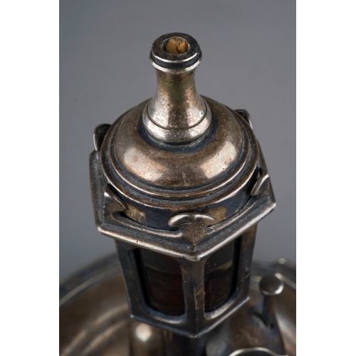 499 - An early 20th Century American white metal combination ashtray, cutter and lighter in the form of a ... 