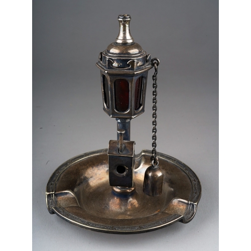 499 - An early 20th Century American white metal combination ashtray, cutter and lighter in the form of a ... 