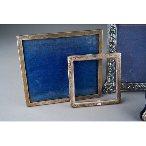 504 - Three Sterling silver 925 photograph frames, various dates and makers together with a white metal ex... 