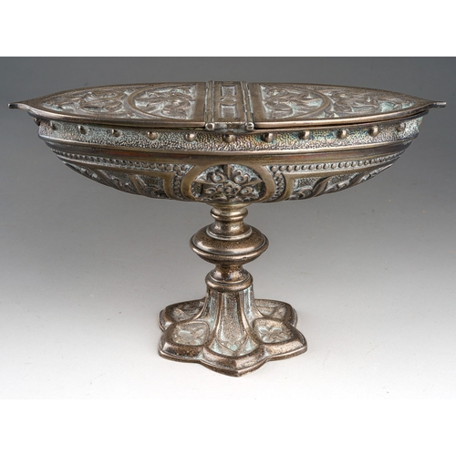 537 - A Continental cast silvered metal boat shaped bon bon dish on raised supports, with foliate decorati... 