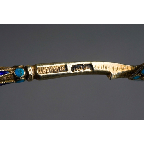 551 - A late 19th Century Russian 84 Standard silver gilt and cloisonne spoon, twist upper stem, stamped t... 