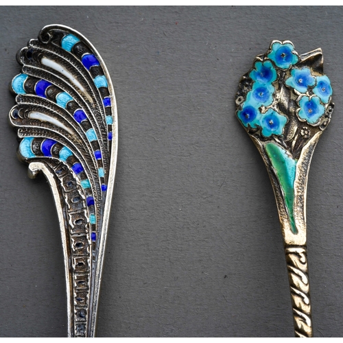 553 - A late 19th Century American silver gilt and enamel coffee spoon, engraving to bowl dated (18)95., m... 