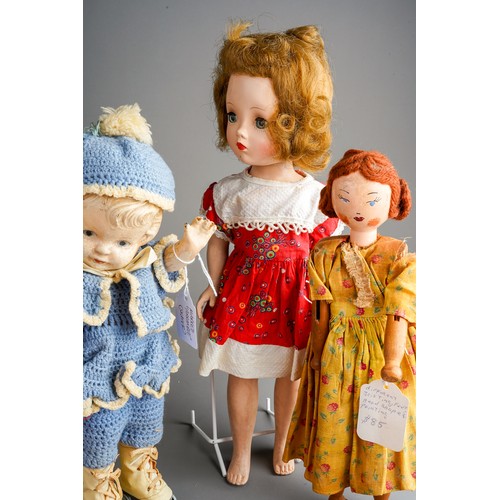 558 - A collection of vintage dolls to include: a Georgian style peg doll with painted face, wool hair, ye... 