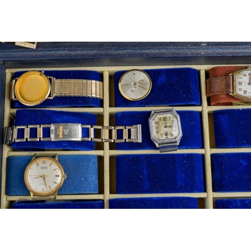 561 - A large collection of vintage watches, mainly men's, to include Times, Tisso, Hamilton etc