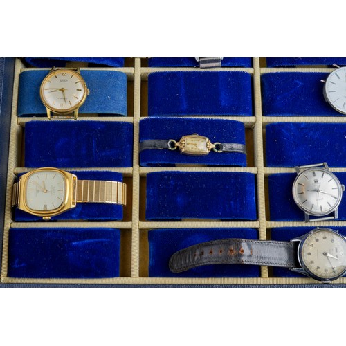 561 - A large collection of vintage watches, mainly men's, to include Times, Tisso, Hamilton etc