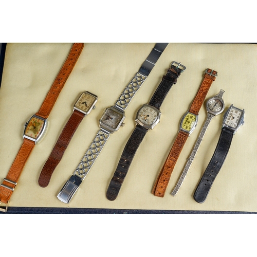 561 - A large collection of vintage watches, mainly men's, to include Times, Tisso, Hamilton etc