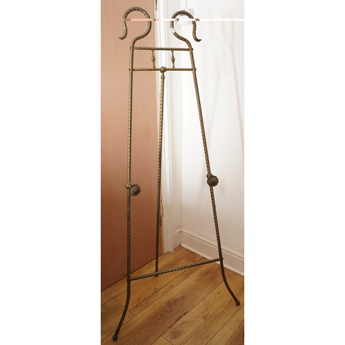 562 - Large floor standing French gilt metal easel, approx. height 154 cm