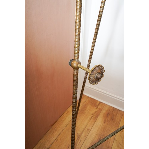 562 - Large floor standing French gilt metal easel, approx. height 154 cm