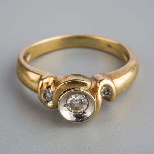 582 - A 9ct gold diamond three stone ring. Set with three graduating round brilliant cut diamond, estimate... 