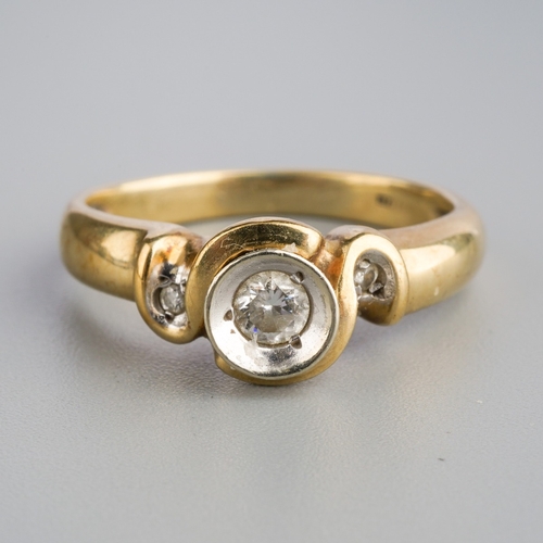 582 - A 9ct gold diamond three stone ring. Set with three graduating round brilliant cut diamond, estimate... 