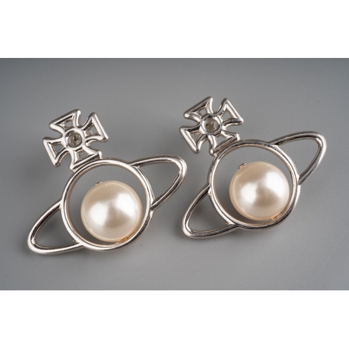 590 - Large pair of Vivienne Westwood earrings set with a pearl to centre, Measuring approx 3.7cm in heigh... 