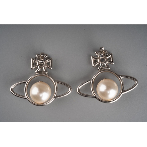 590 - Large pair of Vivienne Westwood earrings set with a pearl to centre, Measuring approx 3.7cm in heigh... 