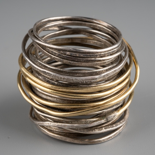 593 - Disa Alsopp Grand Spaghetti ring, 18k yellow gold and sterling silver wrapped wire, gross weight 15.... 