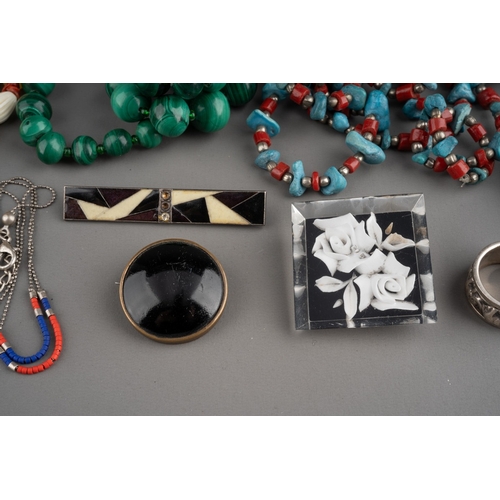 597 - Three ethnic white metal rings and four vintage brooches together with gem set necklaces including a... 