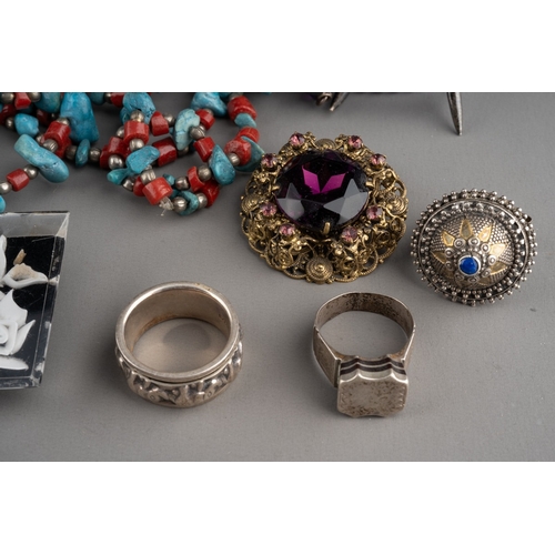 597 - Three ethnic white metal rings and four vintage brooches together with gem set necklaces including a... 