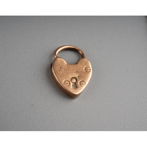 602 - Collection of 9 ct Gold chains and bracelets together with a heart shaped lock, gross weight 11.4g