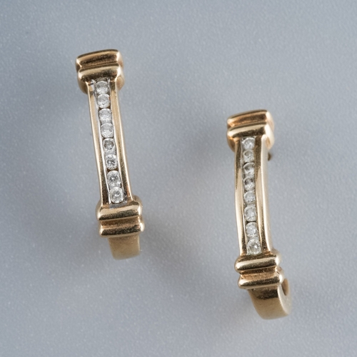 604 - A pir of 8 Diamond set 9 ct gold earrings, gross weight 3.4g