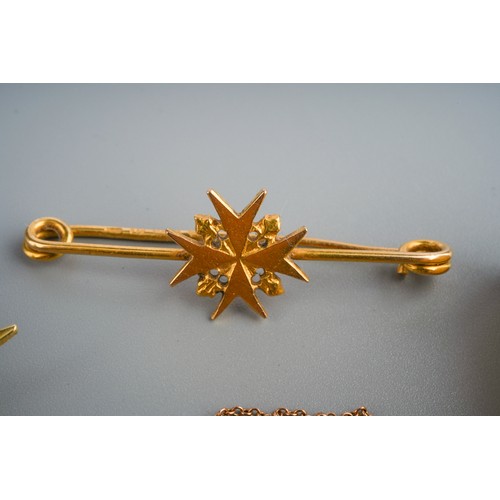 623 - A collection of four pieces of unmarked Maltese yellow metal jewellery, to include a brooch, a bar b... 