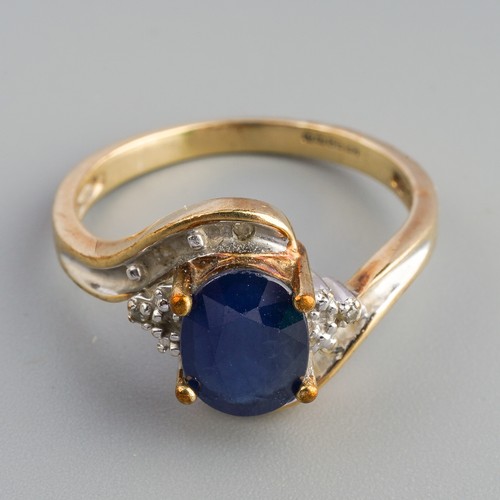 629 - A 9ct gold sapphire and diamond ring and a 9ct gold sapphire bracelet. The ring set with an oval sha... 