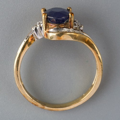 629 - A 9ct gold sapphire and diamond ring and a 9ct gold sapphire bracelet. The ring set with an oval sha... 