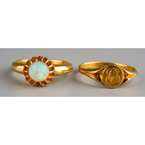 641 - Two 18 ct gold rings one set with opal to centre, gross weight 6.9g