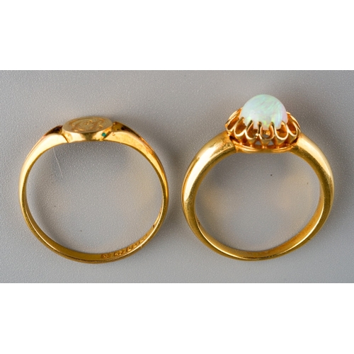 641 - Two 18 ct gold rings one set with opal to centre, gross weight 6.9g