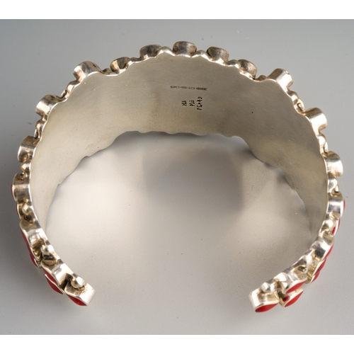 653 - Silver bangle with semi precious stones, marked MLX 925 and full set of import marks