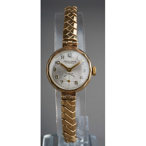 655 - 9 ct gold cased ladies watch