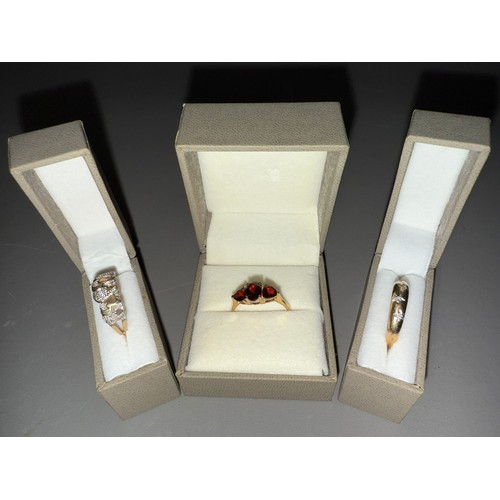 686 - Three 9k gold mounted rings two set with diamond chips and one with semi precious stones.  Gross wei... 