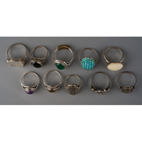 694 - Ten silver rings, set with marcasites and various semi precious stones (10)