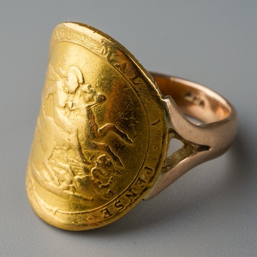 700 - Coin ring - George III (1760 - 1820) A gold full sovereign coin, 1817 on a 9 ct gold band, gross wei... 