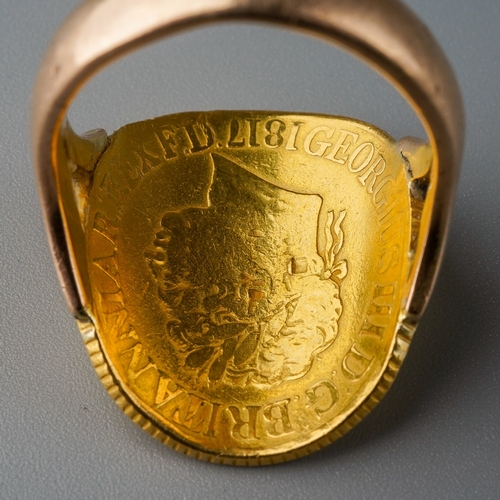 700 - Coin ring - George III (1760 - 1820) A gold full sovereign coin, 1817 on a 9 ct gold band, gross wei... 