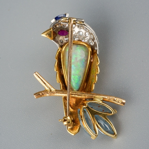 714 - E WOLFE & CO an 18ct gold diamond and gem set novelty brooch. Designed as an exotic bird, with a pea... 