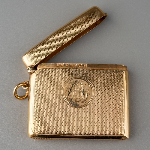 725 - An early 20th Century 9ct gold engine turned vesta case, the central cartouche engraved with initial... 